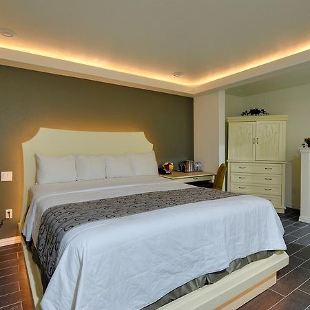 Romantic Inn & Suites Dallas Szoba fotó