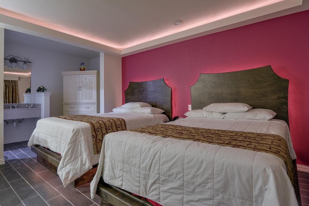 Romantic Inn & Suites Dallas Szoba fotó