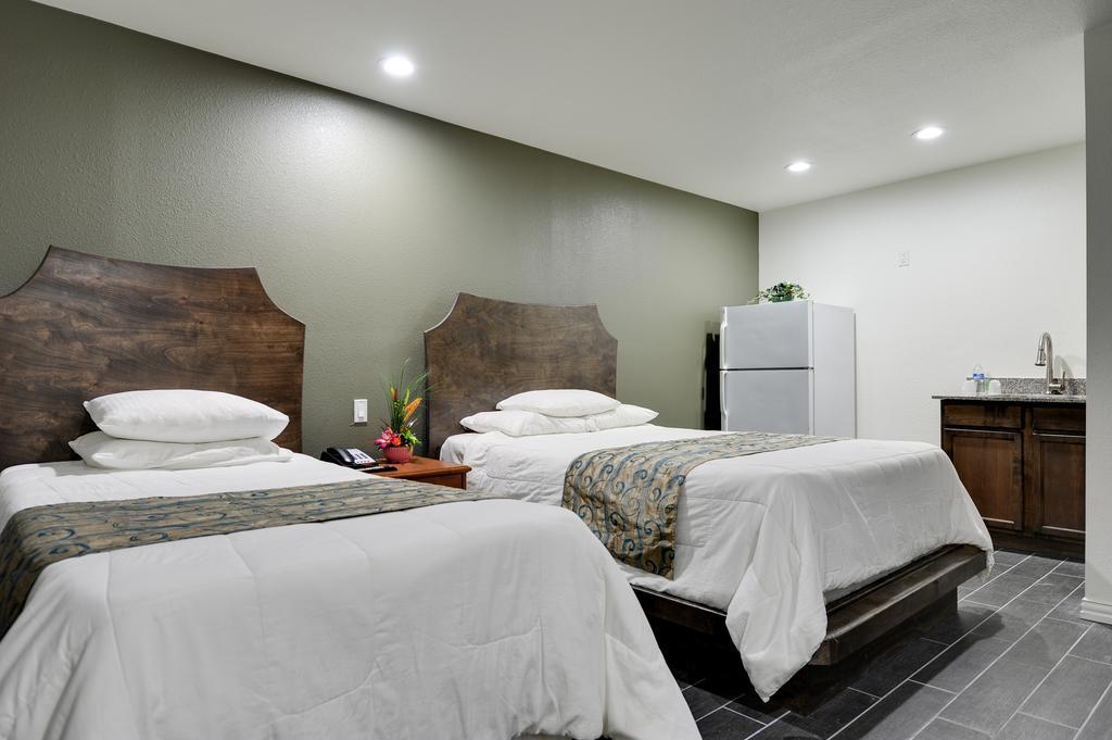 Romantic Inn & Suites Dallas Szoba fotó